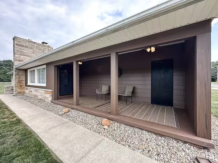 Covered front porch and exterior of the three-bedroom home, Unit A
