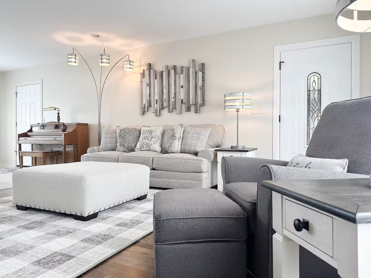 Furnished living room of the three-bedroom home