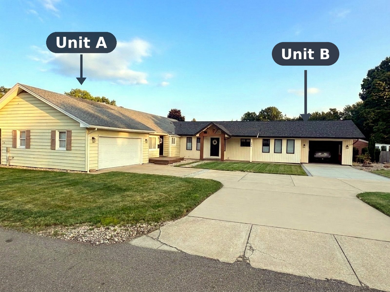 The two homes — Unit A, the three-bedroom, on the left and Unit B, the one-bedroom, on the right, each with its own entrance and driveway